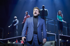 Michael Ball and the company of Chess (c) Brinkhoff Moegenburg (from WhatsOnStage.com)